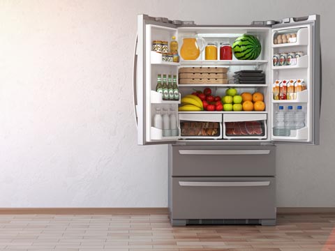 open fridge freezer full of fresh food